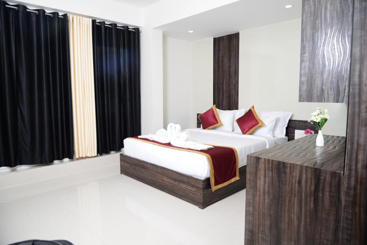 Miles Inn Hotel Хассан Экстерьер фото